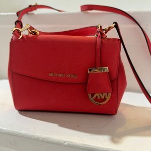 Pink Michael kors cross body purse